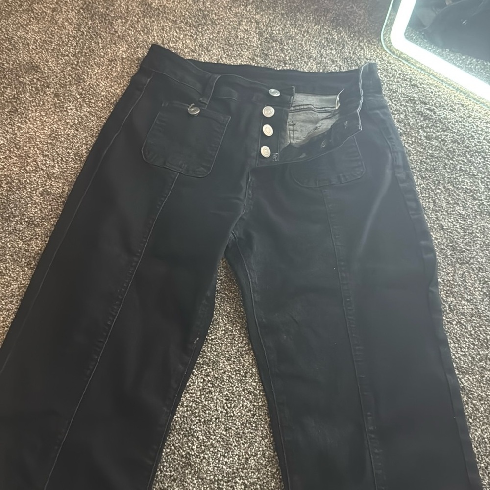 Dark Black Flare Jean. size Large. button up front.